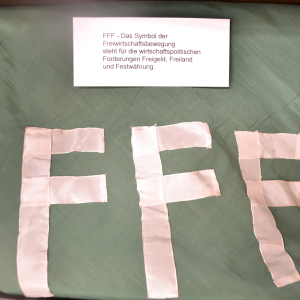 FFF - Das Symbol der Freiwirtschaftsbewegung steht für Freigeld, Freiland und Festwährung